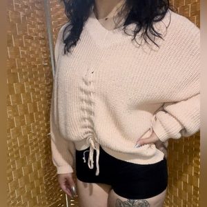 Pink knitted sweater